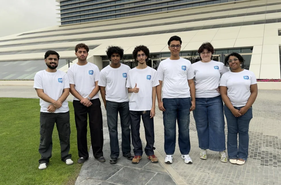 The team in branded t-shirts